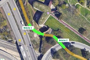 Auf dem Bild ist ein Ausschnitt einer Luftaufnahme zu sehen. Der Ausschnitt zeigt einen Teil der B10, die Festungsmauern der Stadt Ulm, den 